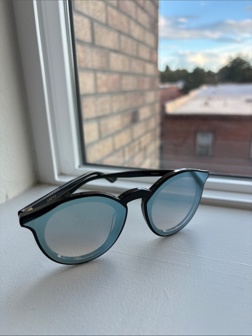KREWE Black Frame Sunglasses with Blue Gradient Lenses
